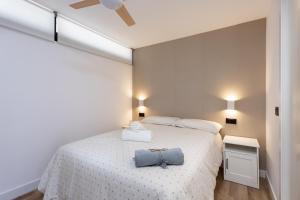 Postel nebo postele na pokoji v ubytování SUNNY Olympia By Sunkeyrents