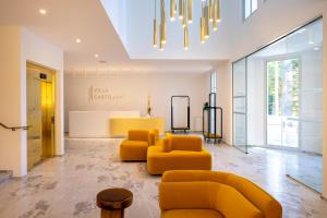 Posezení v ubytování Hôtel Spa Restaurant Villa Castellane