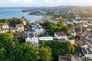 an aerial view of a small town next to the water at Sophias House- Short walk to Town and Seafront in Torquay