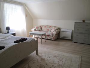 Postel nebo postele na pokoji v ubytování Tüve apartment