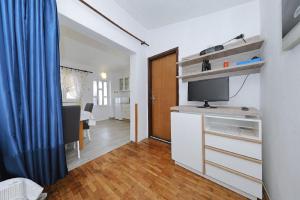 TV a/nebo společenská místnost v ubytování House Tony