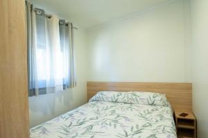 Postel nebo postele na pokoji v ubytování Camping Urbion