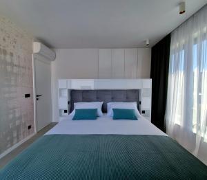 Postel nebo postele na pokoji v ubytování Villa Magic Sky II