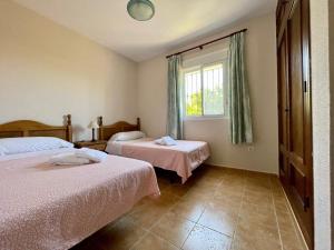 Postel nebo postele na pokoji v ubytování Chalet Pura Vida