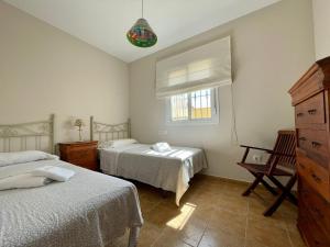 Postel nebo postele na pokoji v ubytování Chalet Pura Vida