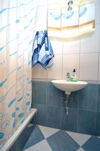 Ванная комната в Apartments and Rooms Mare