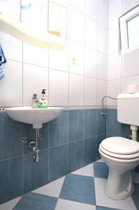 Ванная комната в Apartments and Rooms Mare