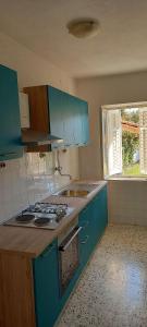 Kuchyň nebo kuchyňský kout v ubytování Apartments Petar