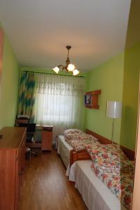 Postel nebo postele na pokoji v ubytování Apartament Jawornik