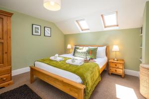 Ліжко або ліжка в номері Laurel Cottage - Aldeburgh Coastal Cottages