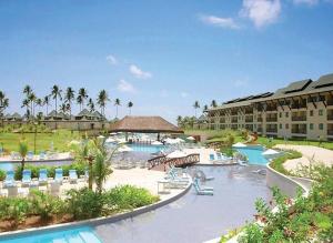 ein Resort mit einem Pool und einem Resort in der Unterkunft Flat no Beach Class Resort in Porto De Galinhas
