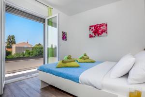 Posteľ alebo postele v izbe v ubytovaní Holiday Home Pinek + 37 fotografií