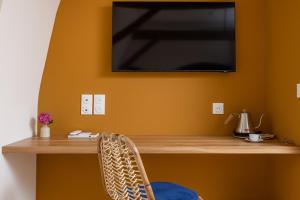 TV a/nebo společenská místnost v ubytování Cueillette