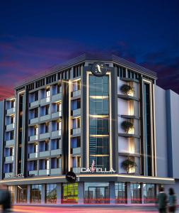 una representación de un edificio de hotel por la noche en Nobel Hotel, en Mersin