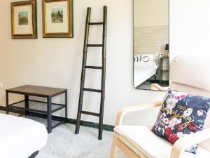Postel nebo postele na pokoji v ubytování Tejares Suite Cordoba