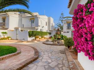 Vonkajšia záhrada v ubytovaní 31 Mijas Playa Club townhouse La Cala