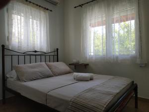 Postel nebo postele na pokoji v ubytování Leodi Place