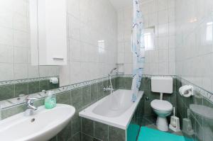 Kúpeľňa v ubytovaní Apartments and Room Ljubica