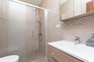 Kúpeľňa v ubytovaní Apartments and Room Ljubica