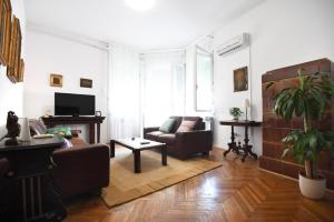 Televízia a/alebo spoločenská miestnosť v ubytovaní City center. Beautiful 130m2 apartmant, sea view