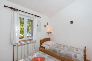 Giường trong phòng chung tại Villa Marina +39 ảnh