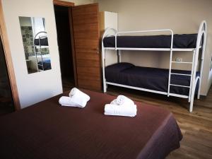 Posteľ alebo postele v izbe v ubytovaní B&B Tonnarella Beach