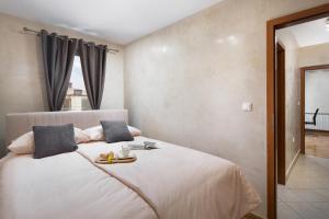 Postel nebo postele na pokoji v ubytování Luxury apartments CasaBlanca/Vivaldi