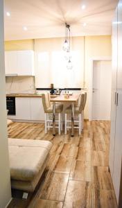 Kuchyň nebo kuchyňský kout v ubytování DelMar Apartments