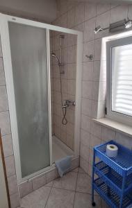 Koupelna v ubytování Apartments Ćenan