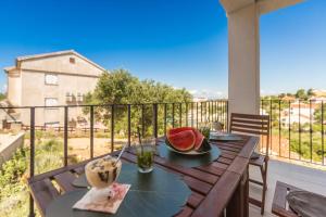 Balkón nebo terasa v ubytování SEA VIEW-STONE HOUSE APARTMENT