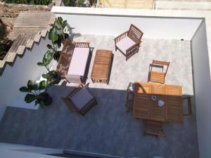 A seating area at Casa Vacanza "La Mangiatoia in corte"