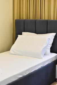 Voodi või voodid majutusasutuse HotelApart - DelMar toas