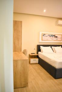 Voodi või voodid majutusasutuse HotelApart - DelMar toas