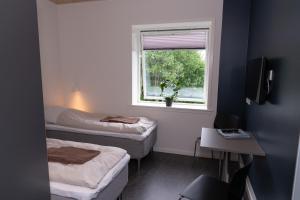 Postel nebo postele na pokoji v ubytování ICV SleepWell