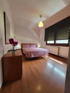 Кровать или кровати в номере Patos Beach III - Olas