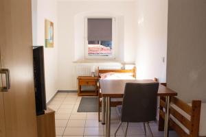 Posezení v ubytování Einladene Fremdenzimmer mit Außengastronomie