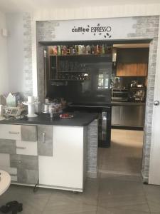 a kitchen with a counter and an oven in it at Villa Mia in Levoča