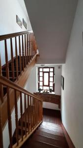 a staircase in a house with a window at APARTAMENTY T.R.11 Apartament nr 3 in Olsztyn