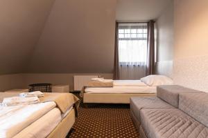 Posteľ alebo postele v izbe v ubytovaní Medical Wellness & SPA Werona
