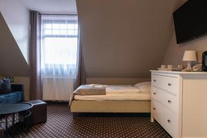Posteľ alebo postele v izbe v ubytovaní Medical Wellness & SPA Werona