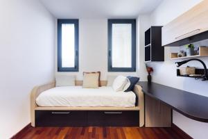 Posteľ alebo postele v izbe v ubytovaní Home2Book Executive & Design Las Torres
