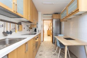 Kuchyňa alebo kuchynka v ubytovaní Home2Book Executive & Design Las Torres