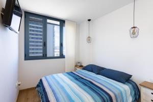 Posteľ alebo postele v izbe v ubytovaní Home2Book Executive & Design Las Torres