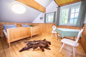 Rúm í herbergi á Wuerttemberger Haus - Hütte