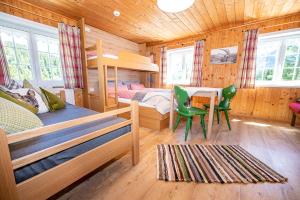 Rúm í herbergi á Wuerttemberger Haus - Hütte