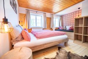 Rúm í herbergi á Wuerttemberger Haus - Hütte