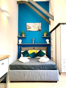 Posteľ alebo postele v izbe v ubytovaní JEF Apartments Fontana di Trevi Loft, Roma