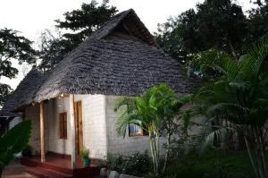 Photo de la galerie de l'établissement Charming Eco-Homestay near Kilimanjaro International Airport, à Arusha