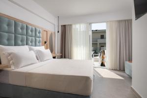 Cama o camas de una habitación en Hanioti Central Hotel
