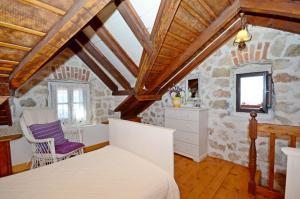 Postel nebo postele na pokoji v ubytování House Vedrana